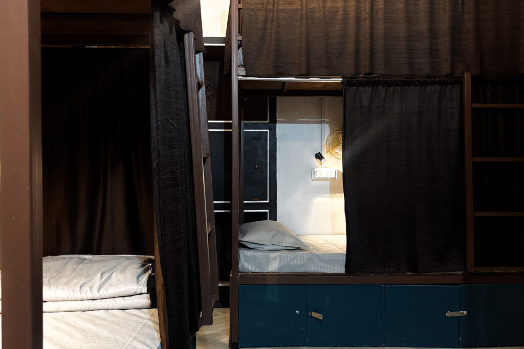 Bed in dorm room at Mosaic Hostel Varanasi Rooftop view at Mosaic Hostel Varanasi Female dorm beds Mosaic Hostel Lobby of Mosaic Hostel Varanasi Wi-Fi zone Mosaic Hostel